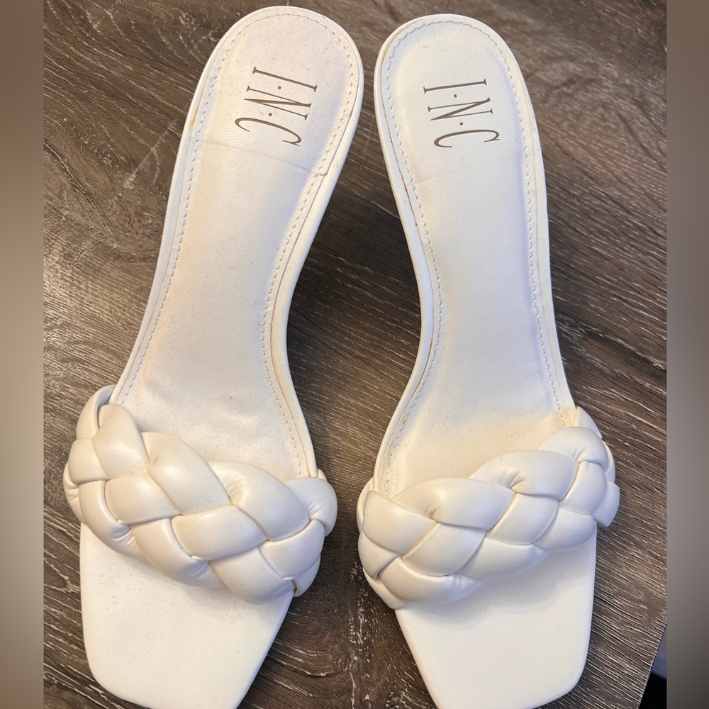 White low heeled sandals. Slip on